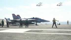 The powerful F/A-18 Super Hornet multipurpose fighter jet in action over a US aircraft carrier